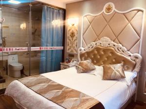 Posteľ alebo postele v izbe v ubytovaní Shell Xuancheng Ningguo City Ningyang East Road Hotel