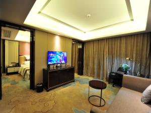 TV a/nebo společenská místnost v ubytování GreenTree Eastern Jinzhai County Lotus Hill Road Hotel