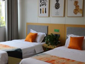 Letto o letti in una camera di Shell Suzhou Chinese Medicine Hospital Hotel