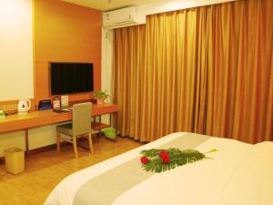 En eller flere senge i et værelse på GreenTree Inn Beijing Fangshan District Jingzhou Road Magezhuang Subway Station Express Hotel