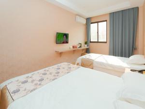 Fotografie z fotogalerie ubytování Shell Jiaxing Jiashan Shenyou Road Hotel v destinaci Ťia-sing