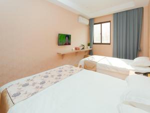 Fotografie z fotogalerie ubytování Shell Jiaxing Jiashan Shenyou Road Hotel v destinaci Ťia-sing + 8 fotografií