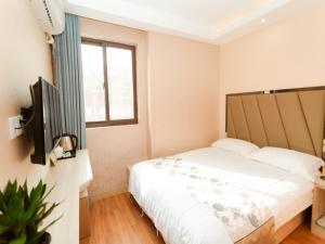 Fotografie z fotogalerie ubytování Shell Jiaxing Jiashan Shenyou Road Hotel v destinaci Ťia-sing