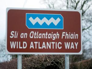 a sign for a wild atlantic way at Ivy House Holiday Home in Valentia Island