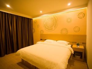 Krevet ili kreveti u jedinici u objektu GreenTree Inn Yongnian County Hebei Shop Express Hotel