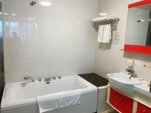 Ένα μπάνιο στο GreenTree Alliance Jiangsu Wuxi Yixing jinsanjiao Bus Station Hotel