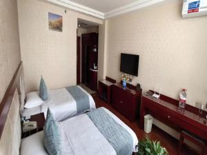 Fotografie z fotogalerie ubytování GreenTree Inn GanSu JiuQuan GuaZhou ZhangZhi Park Express Hotel v destinaci Anxi