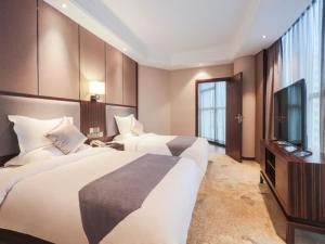 Imagen de la galería de GreenTree Eastern Ganzhou City Zhanggong DistrictEight one four Avenue bus station Hotel, en Ganzhou