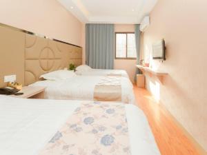 Fotografie z fotogalerie ubytování Shell Jiaxing Jiashan Shenyou Road Hotel v destinaci Ťia-sing