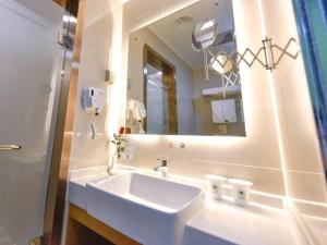 Ванна кімната в GreenTree Inn Henan Kaifeng Jinming District Jinming Square Little Song City Business Hotel