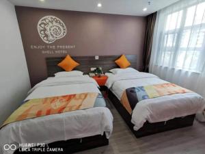 Gallery image of Shell Hefei Yaohai Distrct Baida Zhougudui Daxing RoadHotel in Hefei +5 photos