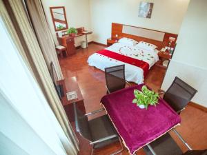 Postel nebo postele na pokoji v ubytování GreenTree Inn HeBei ZhangJiaKou ZhangBei Caoyuantian Rd ZhangKu Avenue Express Hotel