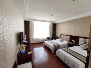 Fotografie z fotogalerie ubytování GreenTree Inn GanSu JiuQuan GuaZhou ZhangZhi Park Express Hotel v destinaci Anxi