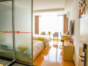 Fotografie z fotogalerie ubytování Shell Bozhou Woyang County Donghuan Road Hotel v destinaci Guoyang + 5 fotografií