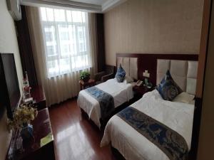 Fotografie z fotogalerie ubytování GreenTree Inn GanSu JiuQuan GuaZhou ZhangZhi Park Express Hotel v destinaci Anxi