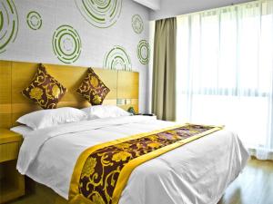 Cama o camas de una habitación en GreenTree Inn Jiangsu Wuxi Beitang District Xinsheng Express Hotel