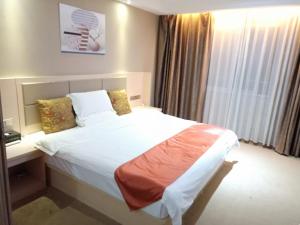 Postel nebo postele na pokoji v ubytování Shell Putian Hanjiang District Hanhua West Road Hotel