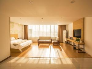 Ένα ή περισσότερα κρεβάτια σε δωμάτιο στο GreenTree Inn Handan Wei County Xianbiao Business Hotel +21 φωτογραφίες