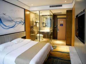 Postel nebo postele na pokoji v ubytování GreenTree Inn Puyang Hualong District Zhongyuan Road Hotel + 6 fotografií