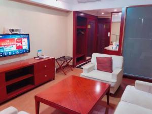 TV a/nebo společenská místnost v ubytování GreenTree Alliance Anhui Chuzhou Middle Qingliu Road Qingliu Bridge Hotel