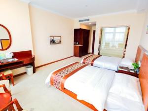 Katil atau katil-katil dalam bilik di GreenTree Inn ShangHai JiaDing the South of F1 Circuit FangTai Hardware Market Express Hotel
