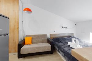 Säng eller sängar i ett rum på Apartments Pomerio Rijeka East