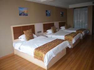 Postel nebo postele na pokoji v ubytování Shell Putian Hanjiang District Hanhua West Road Hotel