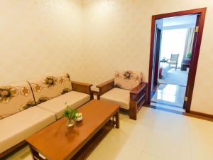 Ruang duduk di GreenTree Inn ShangHai JiaDing the South of F1 Circuit FangTai Hardware Market Express Hotel