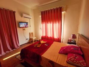 A bed or beds in a room at Joya Apartmento