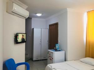 TV a/nebo společenská místnost v ubytování Şato Apart Hotel