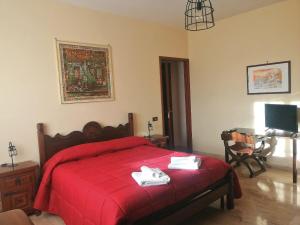 Postel nebo postele na pokoji v ubytování Kalispéra B&B