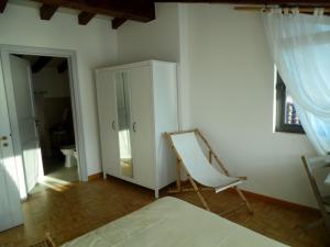 Postel nebo postele na pokoji v ubytování Apartment in Vello by Lake Iseo Beach