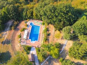 an overhead view of a house with a swimming pool at Belvilla by OYO Il Girasole in Apecchio