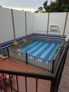 a large swimming pool with at HOTEL ANAPOIMA PLAZA IN in Anapoima