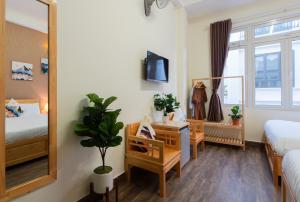 TV in/ali zabaviščno središče v nastanitvi Moc Thach Hostel Dalat