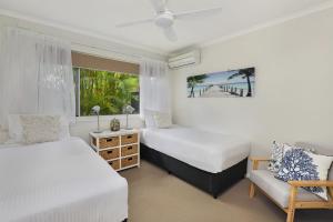 Katil atau katil-katil dalam bilik di Dockside Apartments Mooloolaba