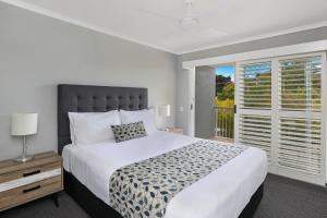 Katil atau katil-katil dalam bilik di Dockside Apartments Mooloolaba