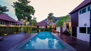an image of a swimming pool in a house at The Cliff Elegance Resort in Ao Nang Beach