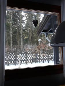 Balkón nebo terasa v ubytování Waldsee-Ferienhaus-mit-Kamin-W-Lan