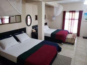 מיטה או מיטות בחדר ב-Carolina Point Resort