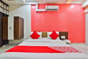Hotel Bansidhar-Somnath客房内的一张或多张床位
