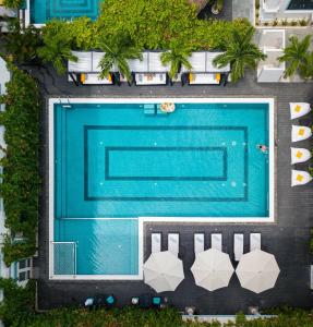 an overhead view of a swimming pool at a hotel at Hoian Sincerity Hotel & Spa in Hoi An