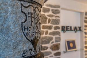 a metal pole with a sign on it in a building at Chalet Ramona in Grächen