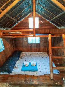 an inside view of a boat with two beds at Rio Beach Resort in Alegria +52 photos