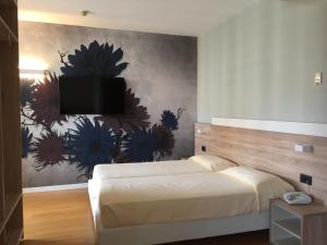 Cama o camas de una habitación en Hotel Italy