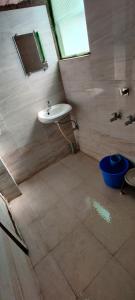 Een badkamer bij Solanki Guest House