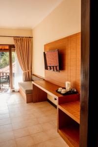 TV/Unterhaltungsangebot in der Unterkunft New Sunari Lovina Beach Resort