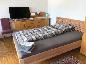 Łóżko lub łóżka w pokoju w obiekcie City Apartments Klinikum