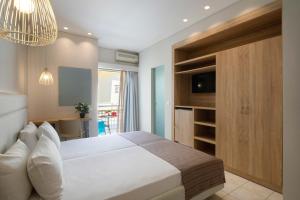 Voodi või voodid majutusasutuse Hotel Rossis toas