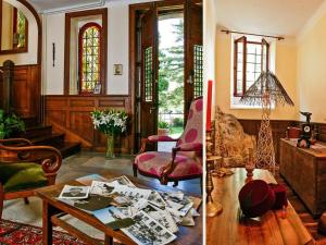 sala de estar con muebles y mesa. en manoir de la malartrie en Vézac